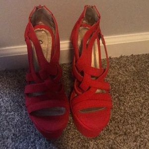 Red, platform, braided heels.